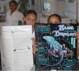 Tracy and Adlin holding the Blue Dragon posters